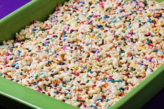 A box filled with different types of food, with Cake and Batter