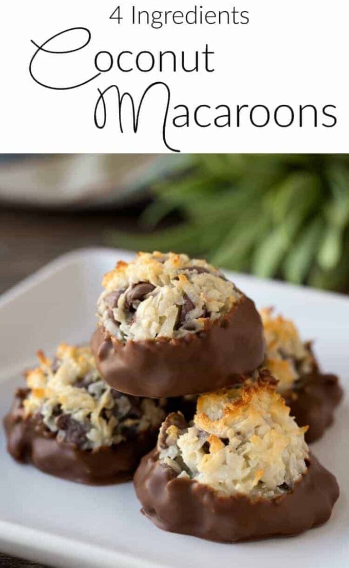 This Chocolate Dipped Coconut Chocolate Chip Macaroon Recipe makes the most sweet and chewy dessert with only 4 ingredients #macaroons #easydessert #chocolatechip #coconut #almondjoy #passoverdessert #passoverrecipe #dessert #coconutrecipe Chocolate Dipped Coconut Chocolate Chip Macaroon Recipe on a white plate