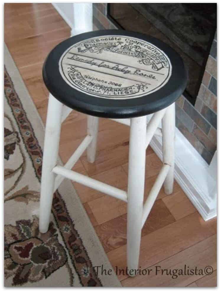 A stool in front of a wooden table