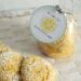 Lemon cake mix cookies in a gift bag with a gift tag on top