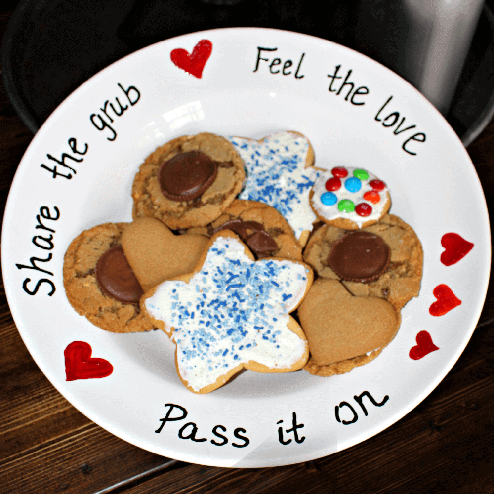 A close up of a doughnut on a plate, with Cookie