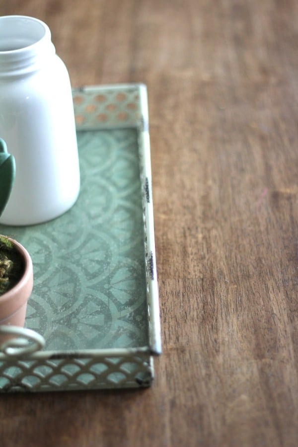 A close up of a coffee cup sitting on top of a wooden table, with Makeover and Coffee table
