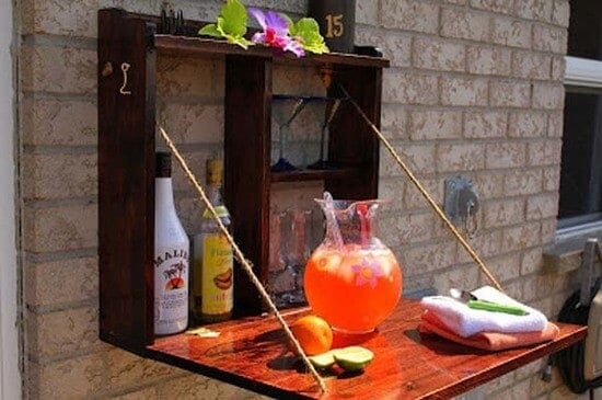 Build a backyard bar - this fold away bar will be great for serving and space saving! 