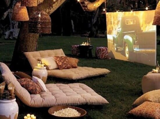 Build a backyard movie theater from Momtastic. I mean seriously, what isn't better than a warm summer night, hanging outside with friends, (with a glass of wine for the adults), popcorn for the kids - all watching a movie on a huge screen! My kids would go crazy over this!