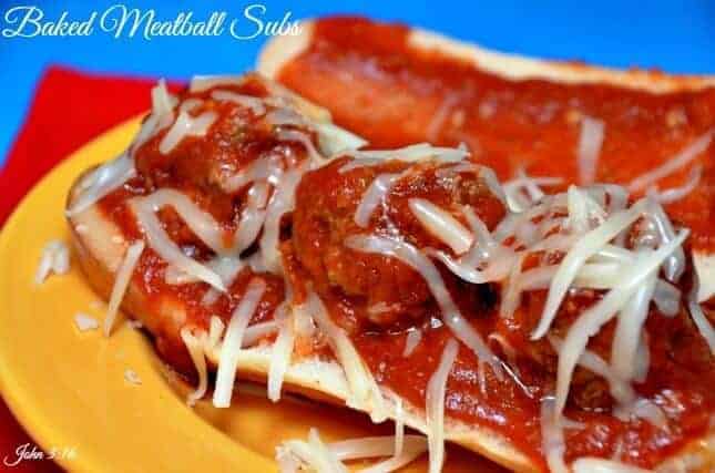 A close up of a plate of food with a slice of pizza, with Meatball and Sauce