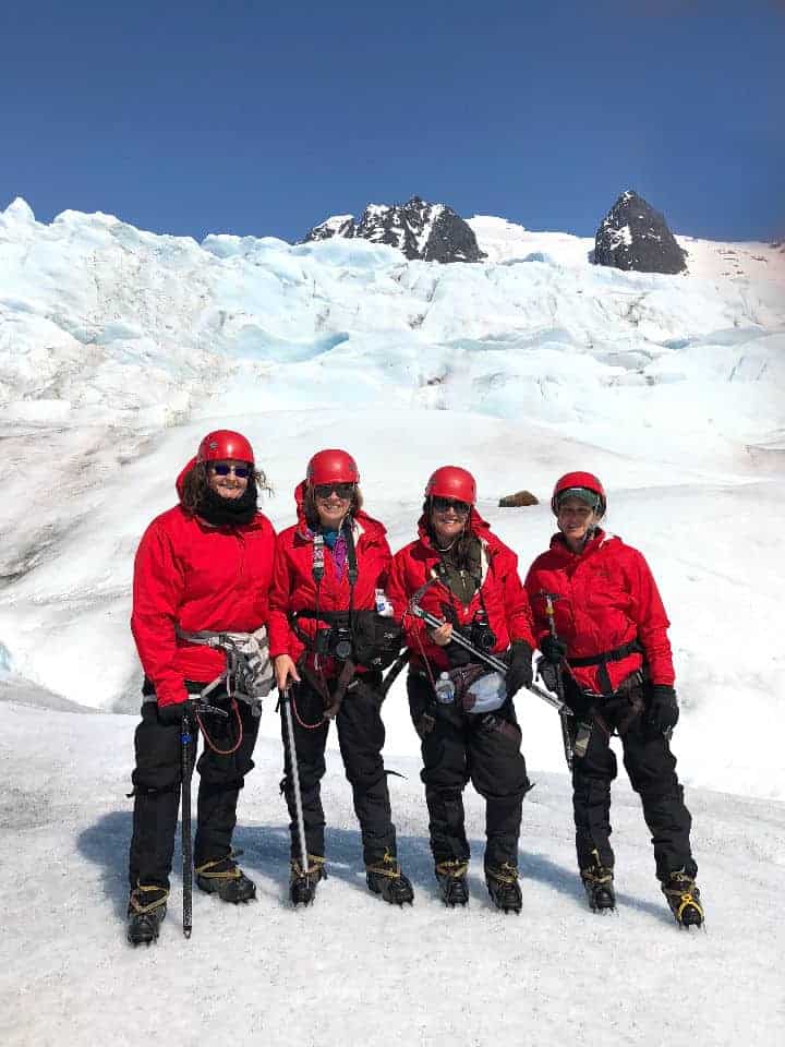 hikers on a glacier