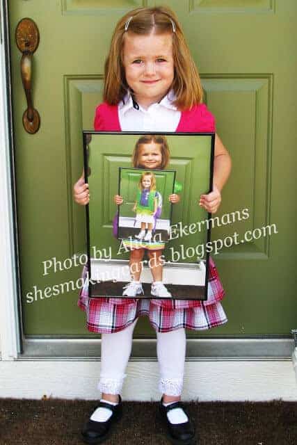 A little girl posing for a picture