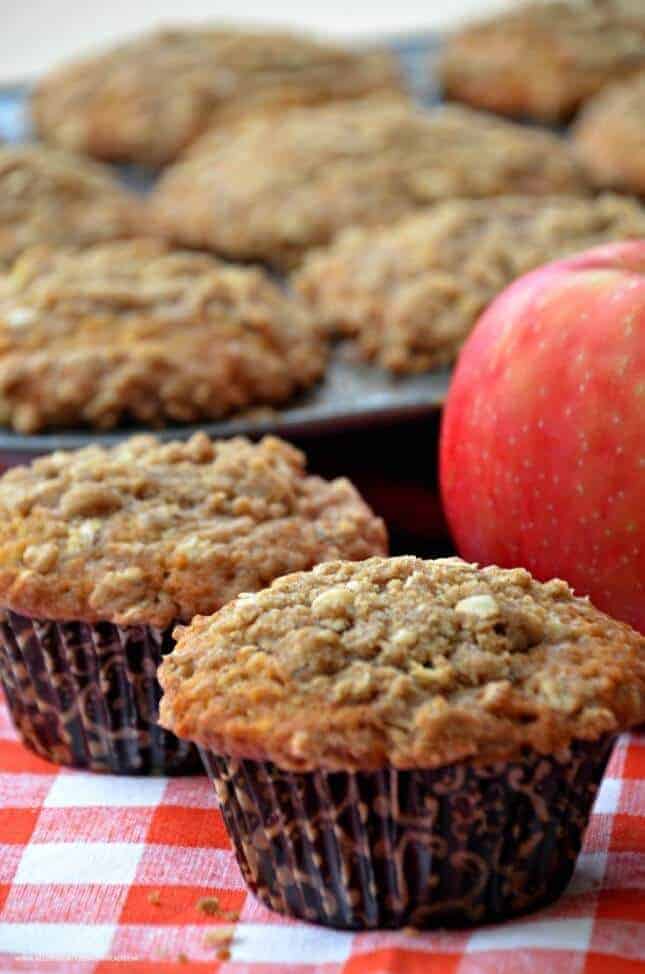 These Apple Muffins with a crumb topping are not only delicious but will make your house smell amazing. The fresh apples, allspice, and cinnamon in these muffins are perfect for fall.