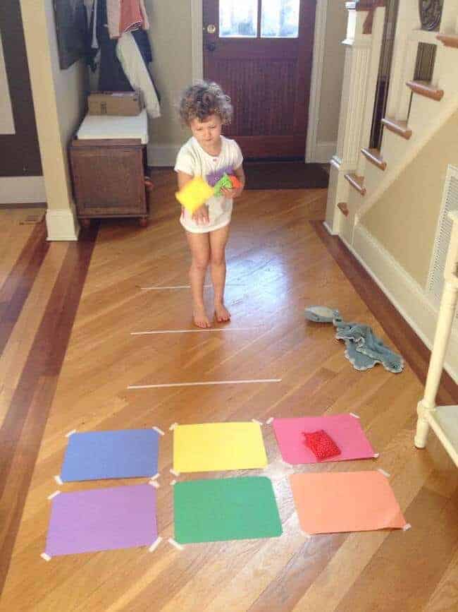 Make your own indoor bean bag toss game - great rainy day activity