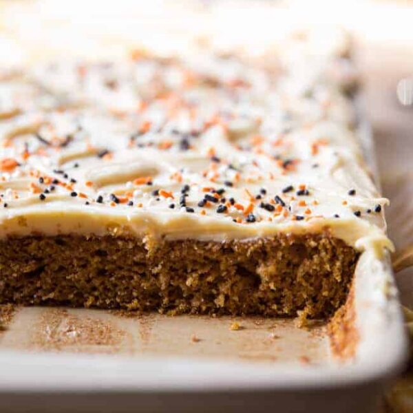 A close up of a piece of cake on a plate, with Pumpkin