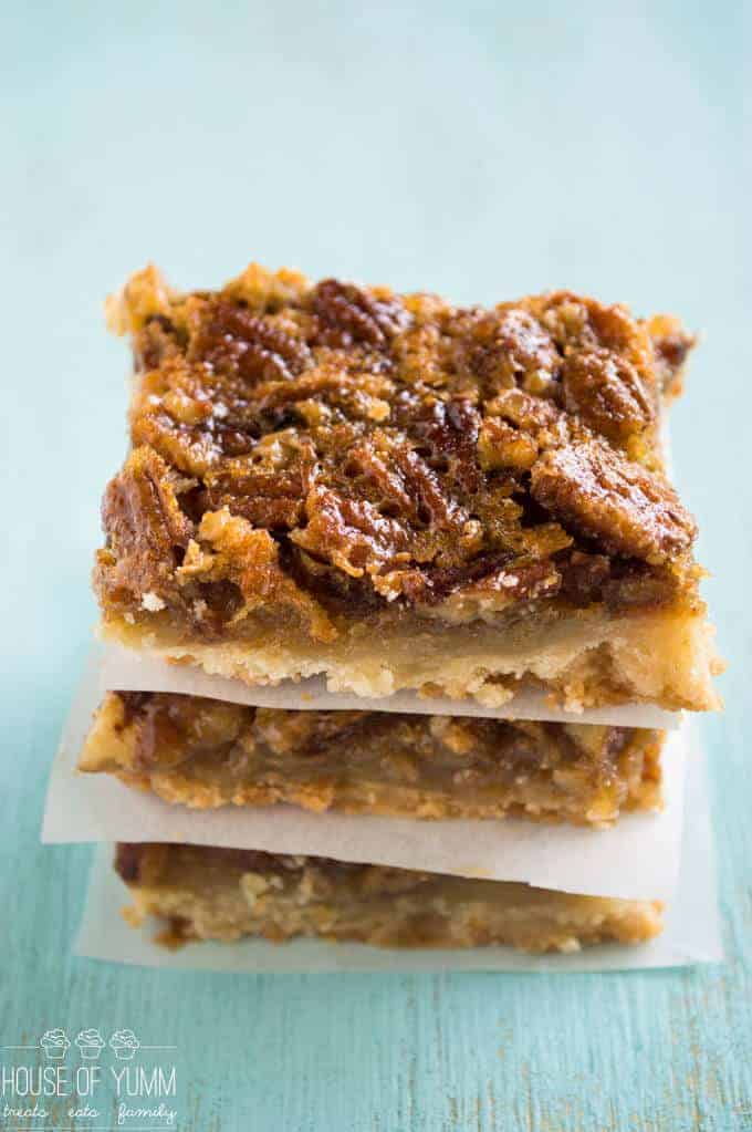 pecan pie bars stacked on top of each other