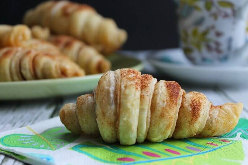 Food on a plate, with Cinnamon and Croissant