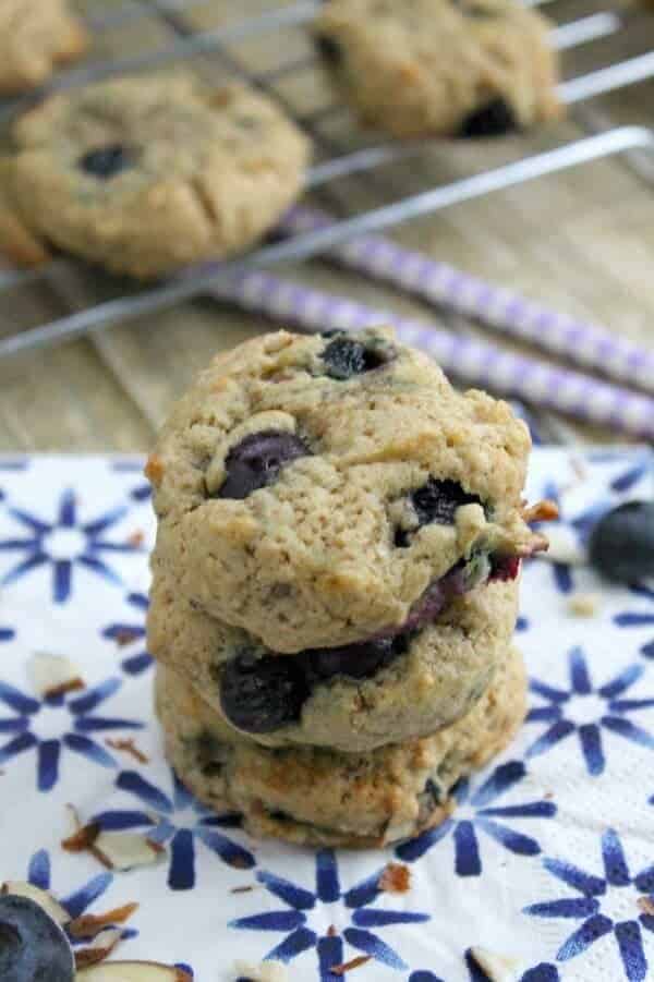Blueberry almond cookies stacked on top of each other