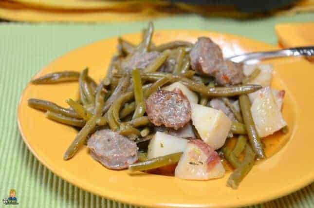 A plate of food, with Italian sausage