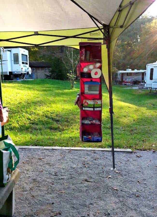 Use a shoe hanger when you go camping to organize supplies