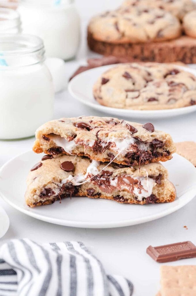 s'mores cookies on a white plate broken open
