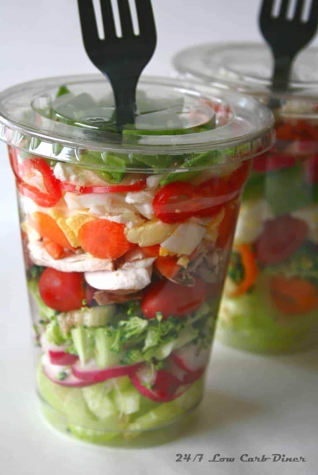 Chopped Salad in a Cup from 247 Low Carb Diner - what should you serve for a large crowd at your party? This is an easy grab and grow food for a crowd and other genius party hacks and tips