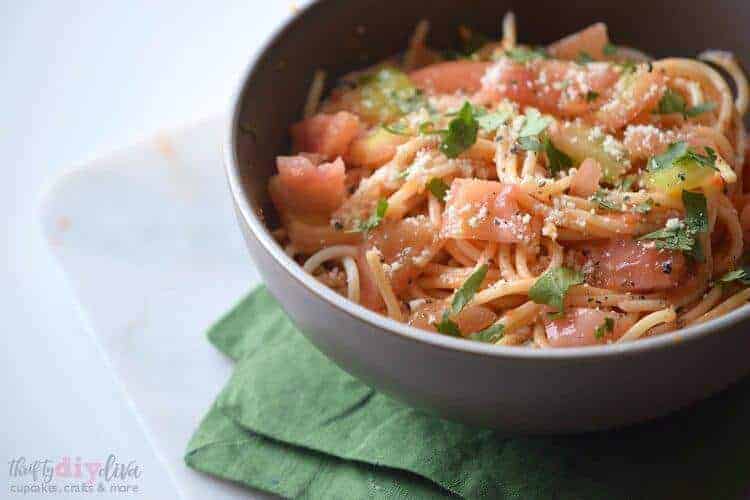 A bowl of food with broccoli, with Pasta and Spaghetti