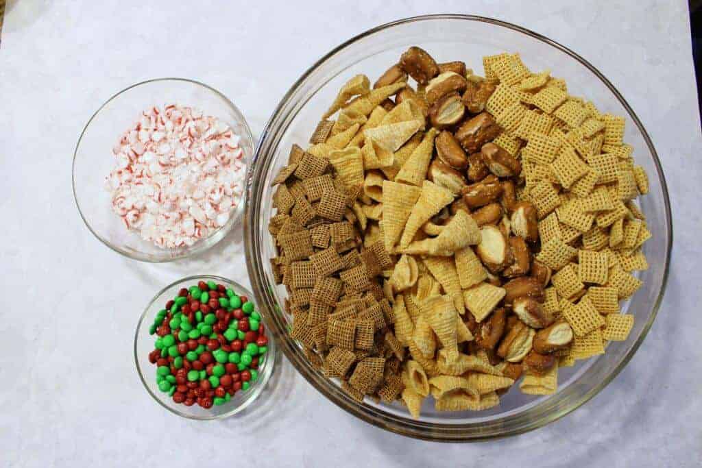 Chex Mix recipe Dry Ingredients - mini m&m's, starlight peppermints, pretzels, bugels 