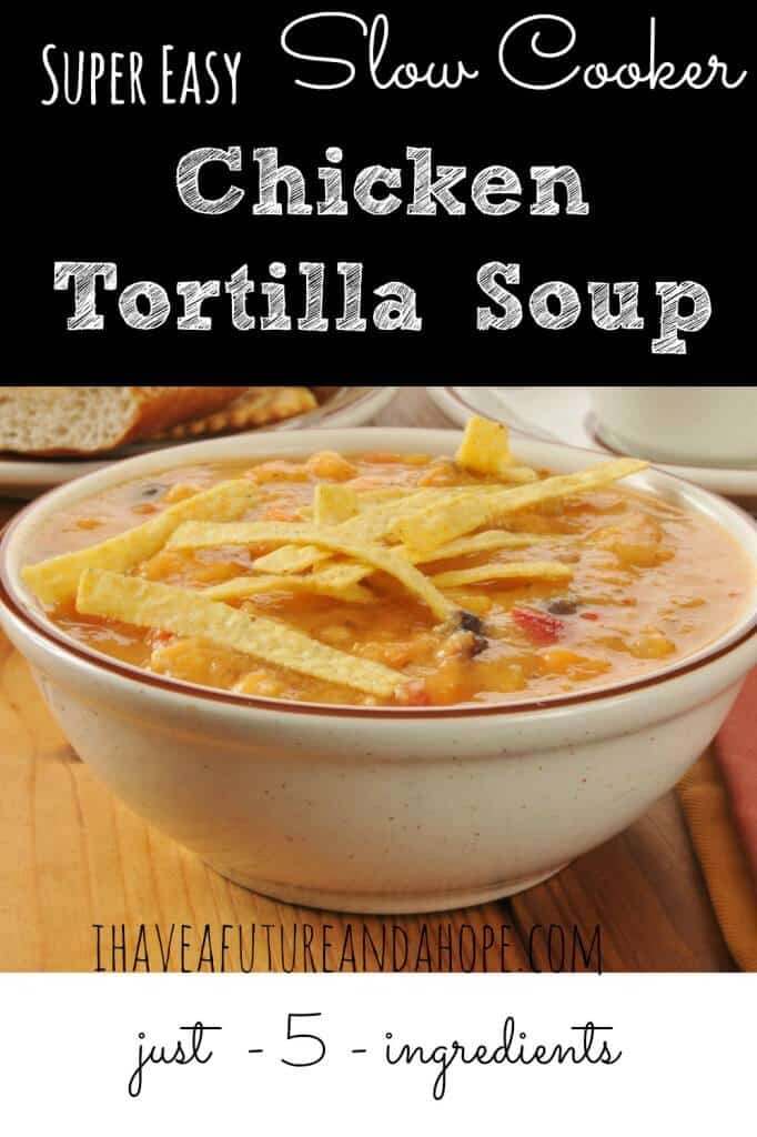 A bowl of food on a table, with Soup and Chicken