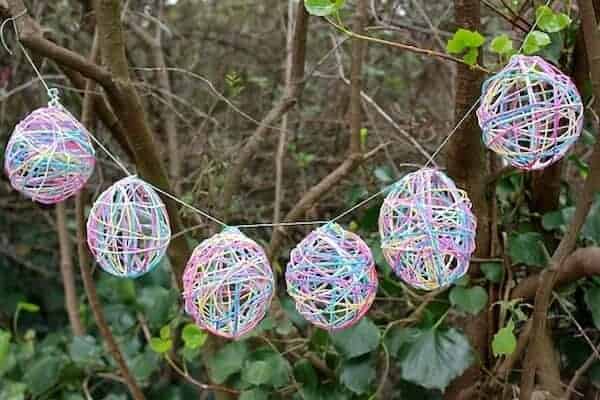 Yarn Easter Egg Garland via Mod Podge Rocks | The Coolest Easter Egg Ideas