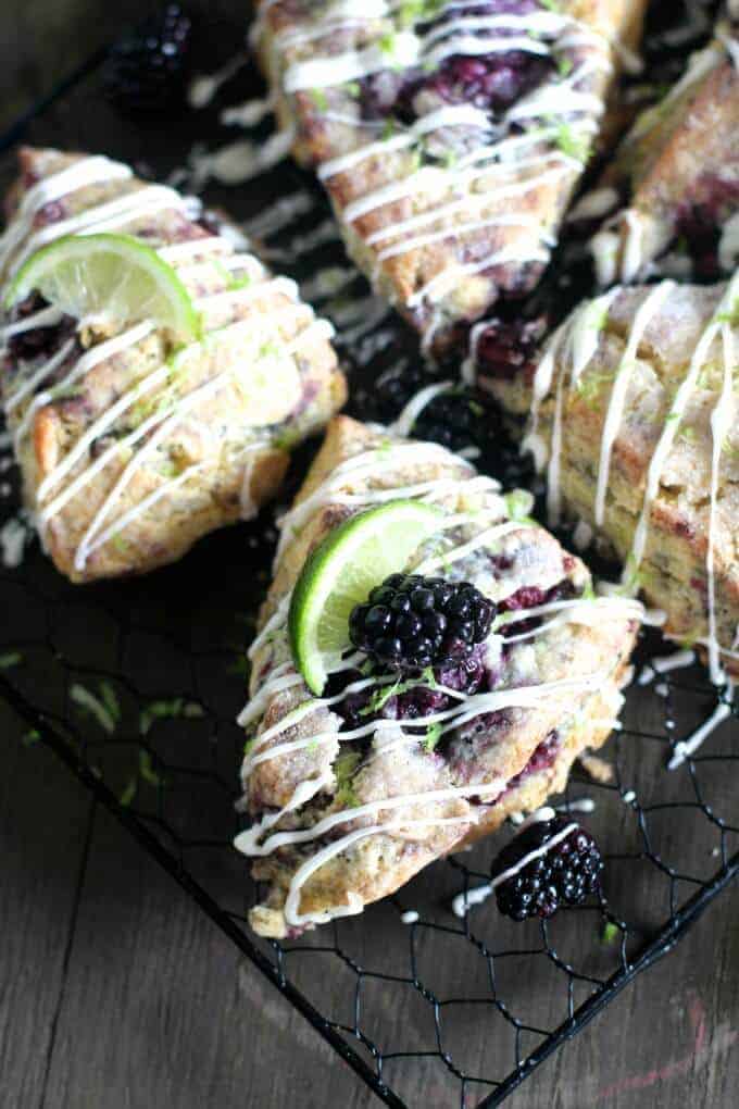 A close up of food, with Berry and Scone