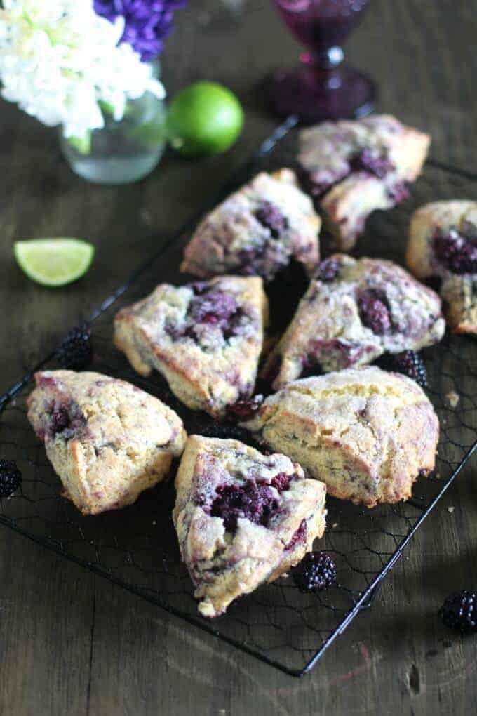 Food on a cutting board with a cake, with Scone and Lime