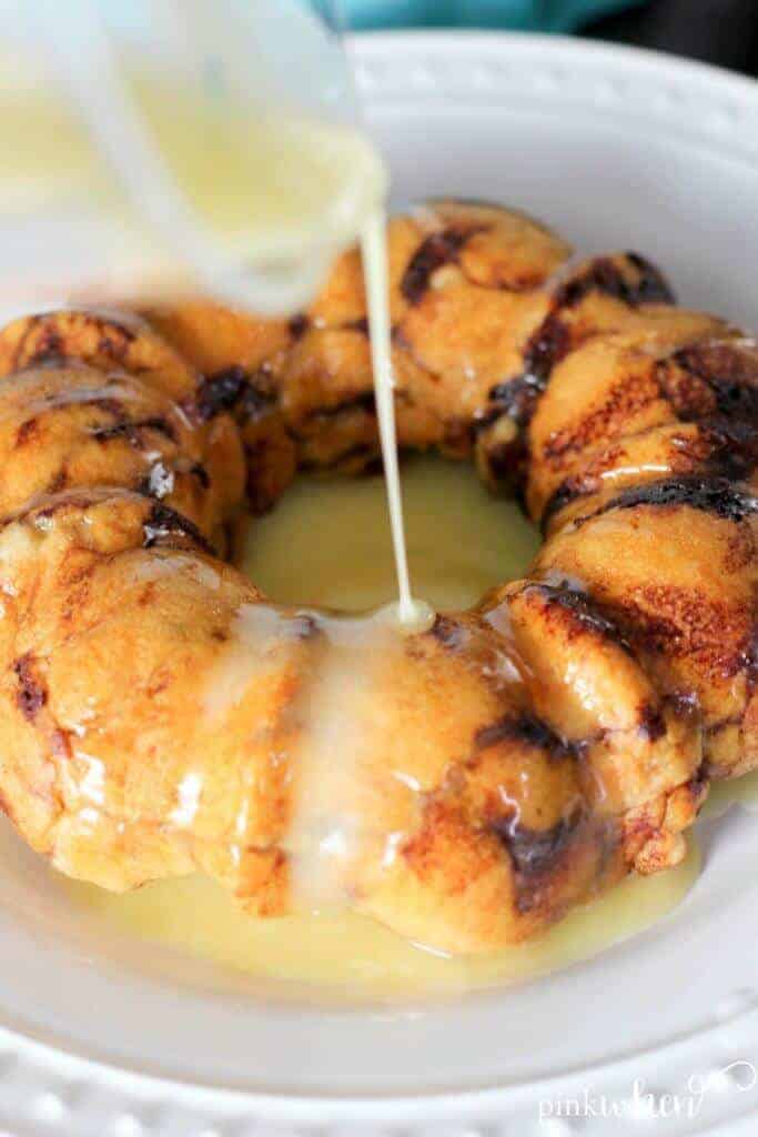 A plate of food, with Monkey bread and Cake