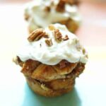 Delicious Cinnamon Roll Muffins with Pecans and Tangy Cream Cheese Frosting
