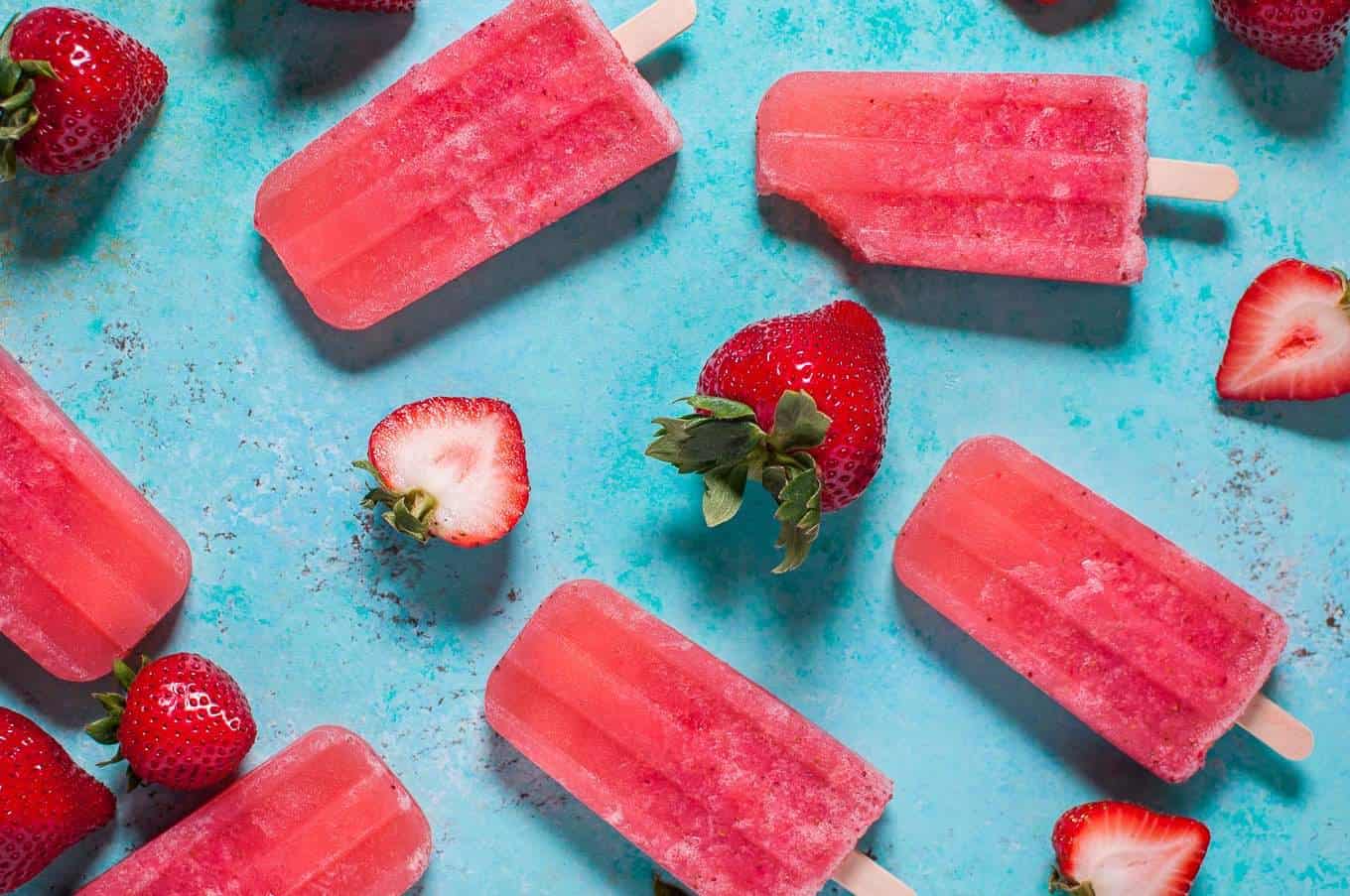 Strawberry Moscato Popsicles by Salt and Lavender and other amazing adult popsicle recipes!