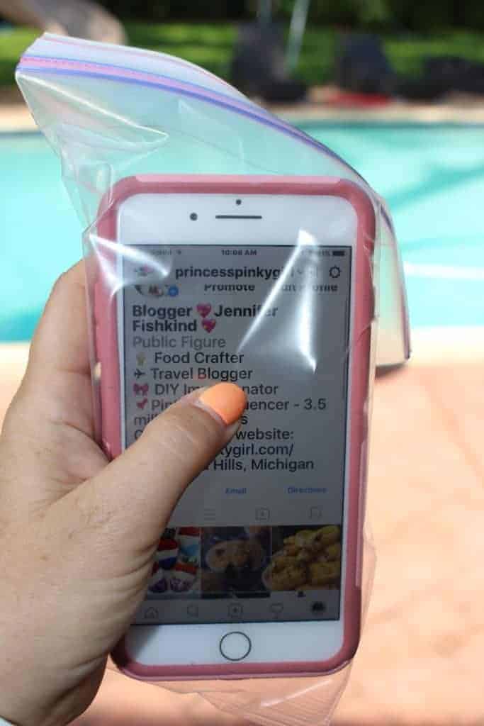 Use a plastic bag to protect your phone from pool, beach, ocean and sand. Great beach hack