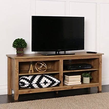 A flat screen tv sitting in a living room