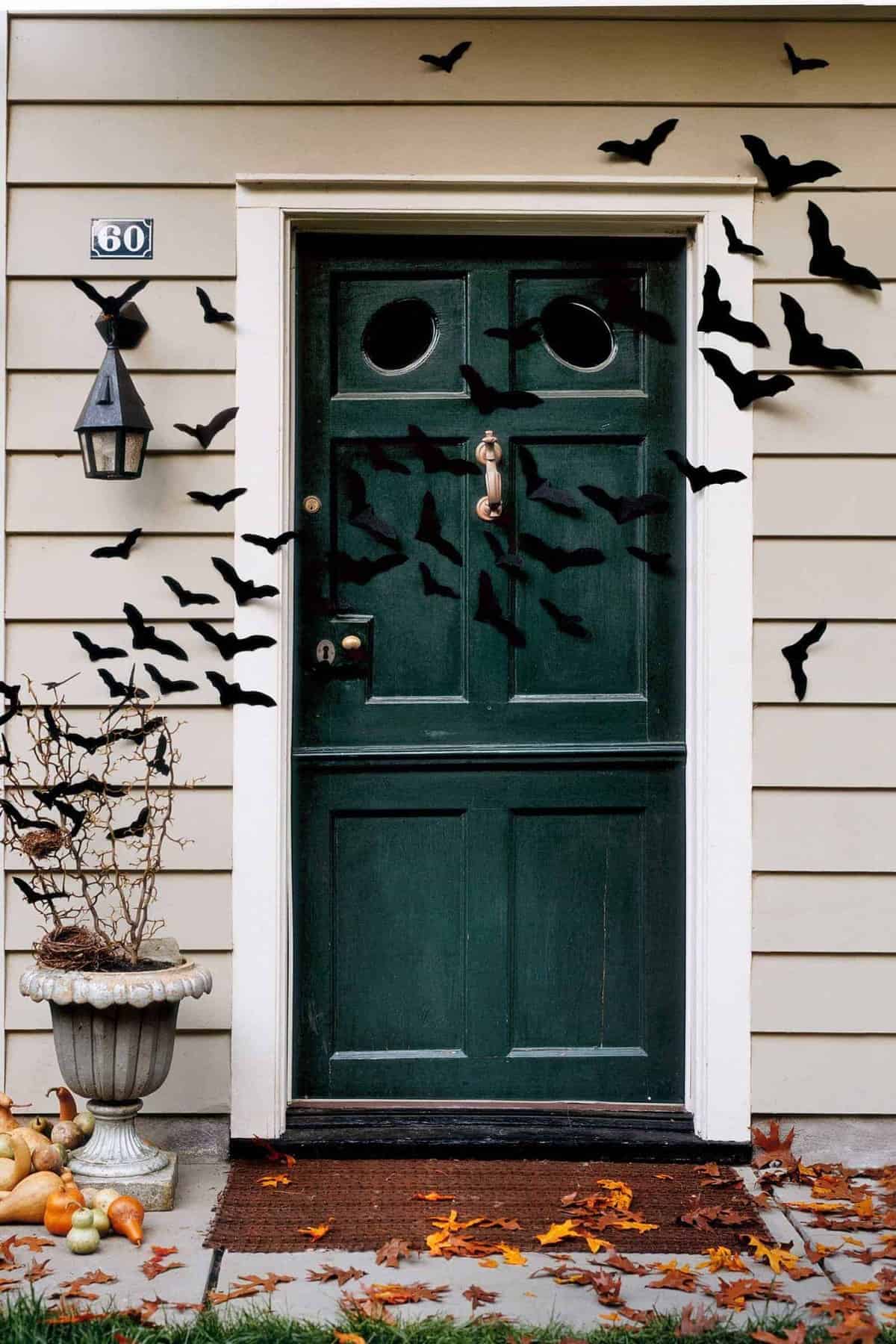 Bat Filled Door Via Country Living | and other great Halloween Door decorations