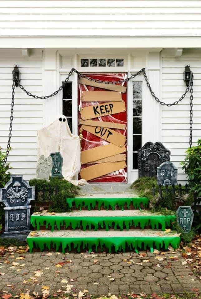 Ghostly Graveyard via Women's Day | and other great Halloween Door decorations