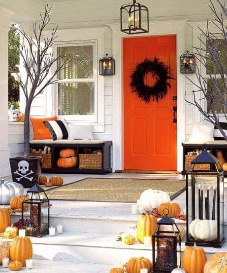 Orange Front Door via Babble | and other great Halloween Door decoration ideas