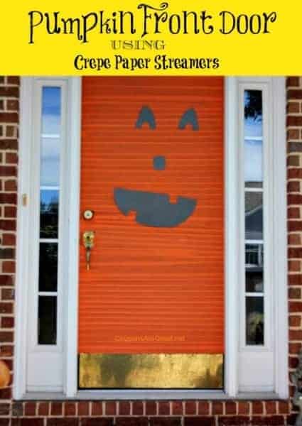 A door decorated as a pumpkin