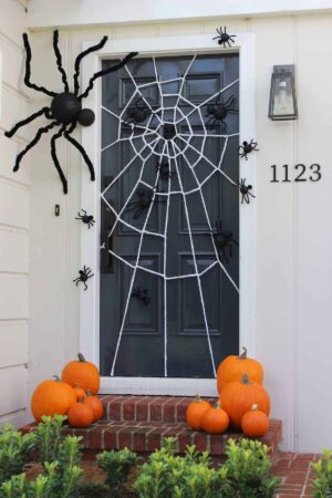 Halloween Door Decorating Ideas Frighteningly Fabulous Princess   Spider Web Door Via Catch My Party 300x450 