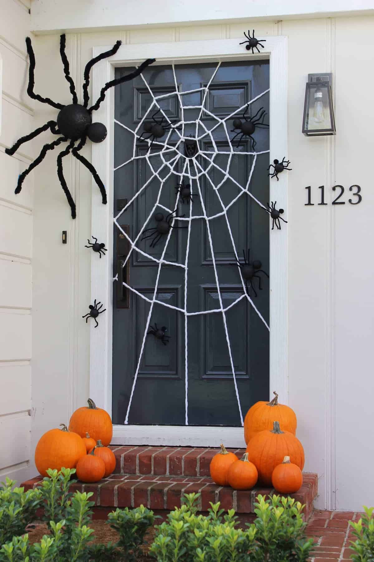 Spider Web Door via Catch My Party | Frighteningly Fabulous Halloween Door Decor Ideas