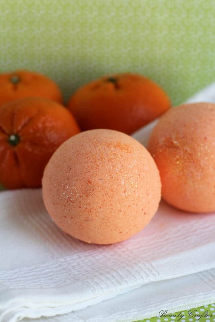 Therapeutic Orange Bath Bombs by Beauty Crafter | Make Your Own Luxurious Bath Bombs with these 15 Awesome DIY Bath Bomb Recipes