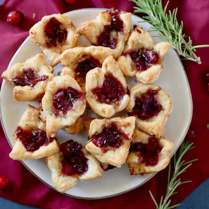 Cranberry Brie Bites - an easy appetizer with only 3 ingredients! Perfect for holiday parties