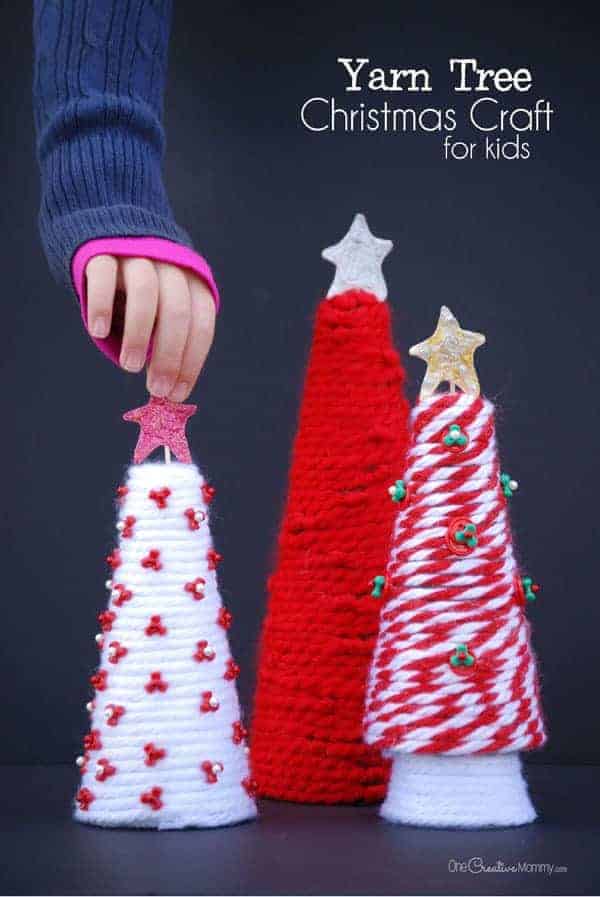 Yarn Tree Christmas Craft idea by One Creative Mommy | The best ever kids Christmas Craft Ideas. So many fun ideas to get the kids involved in the holiday fun!