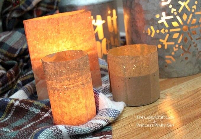 punch holes in the brown paper bags  Paper bag lanterns, Winter paper  crafts, Winter paper