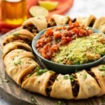 Beef Taco ring with guacamole and salsa in the center