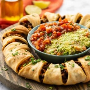 Beef Taco ring with guacamole and salsa in the center