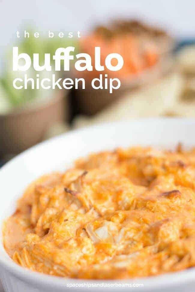 Buffalo chicken dip in a white dish with the words buffalo chicken dip on it