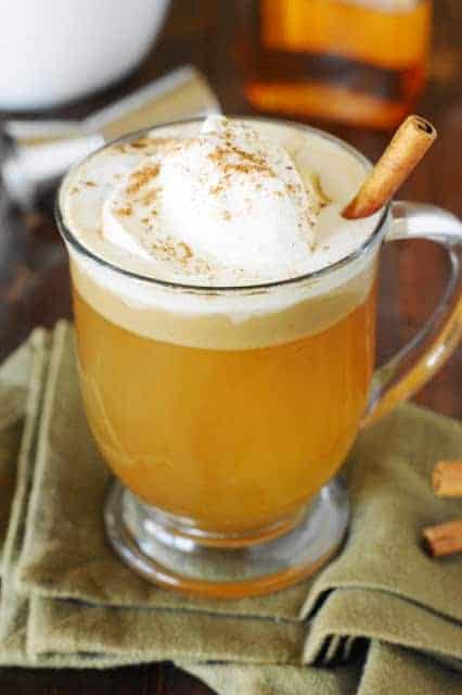 Hot buttered rum in a glass mug