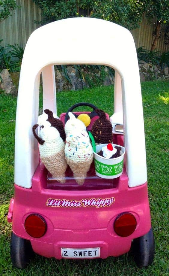 The back of a cozy coupe car