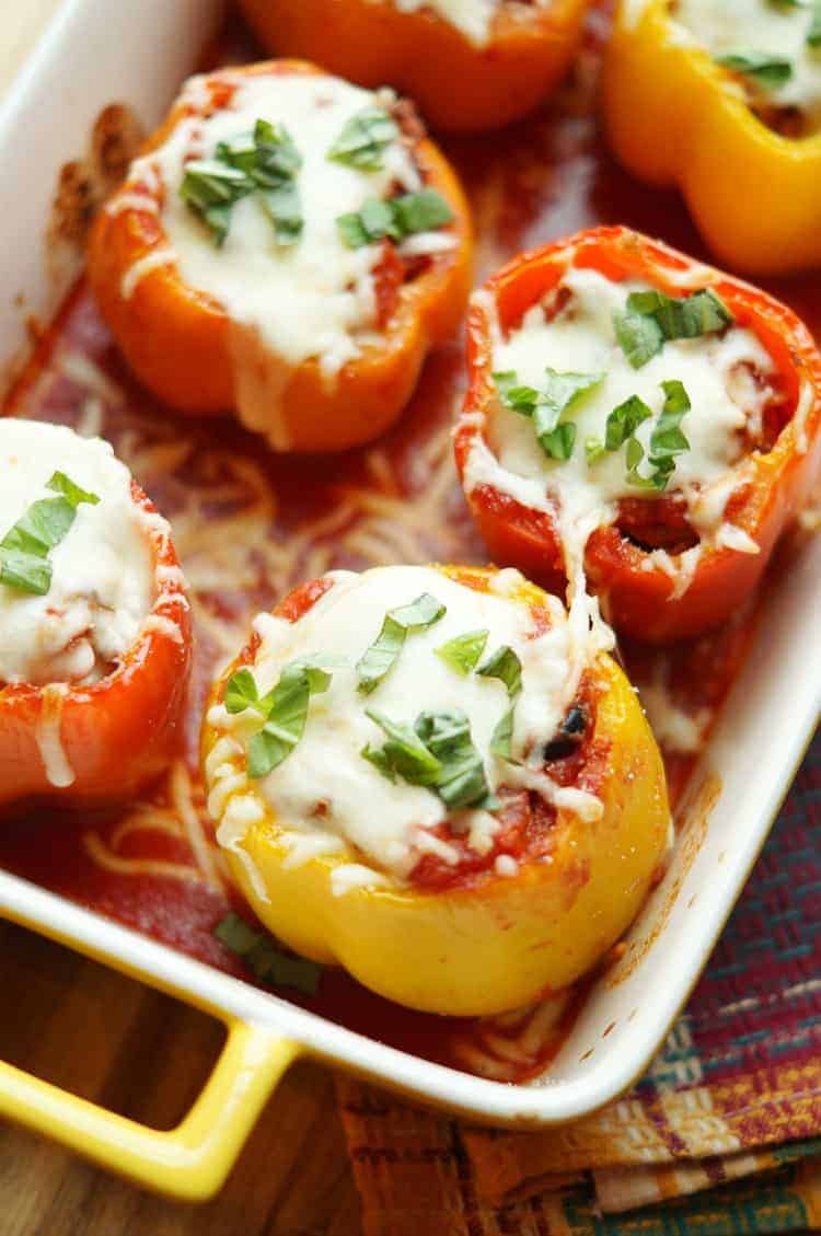 Pizza stuffed peppers on a white plate