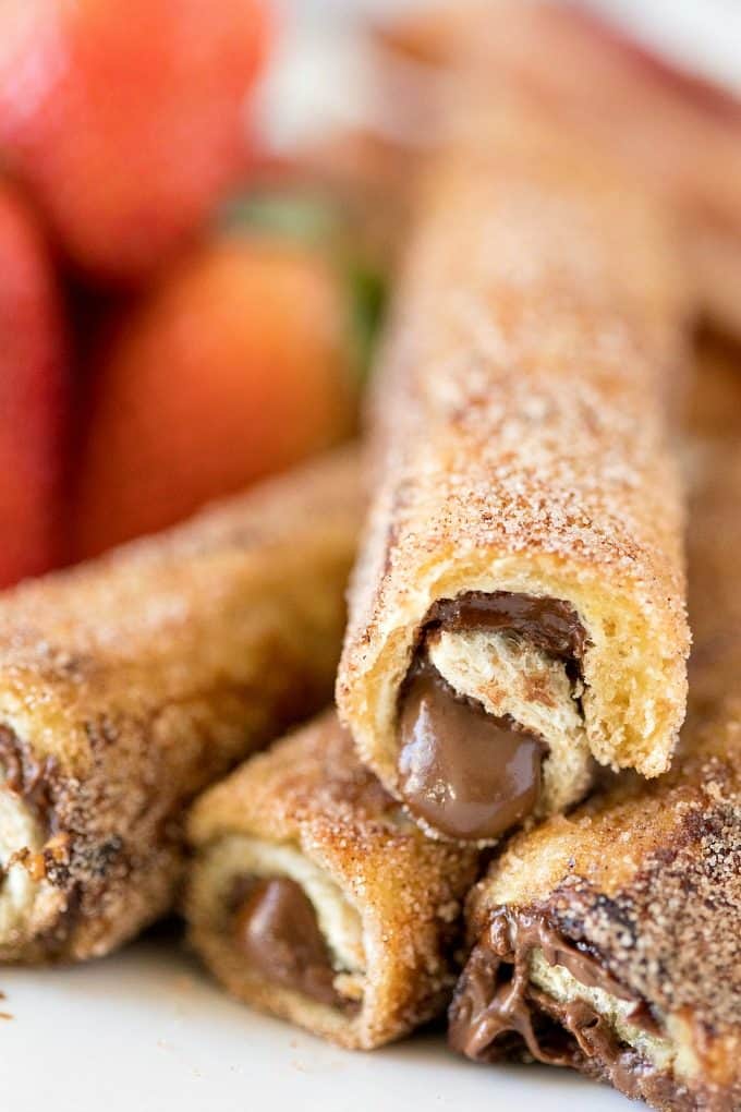 Nutella French Toast Roll Ups with nutella oozing out of center