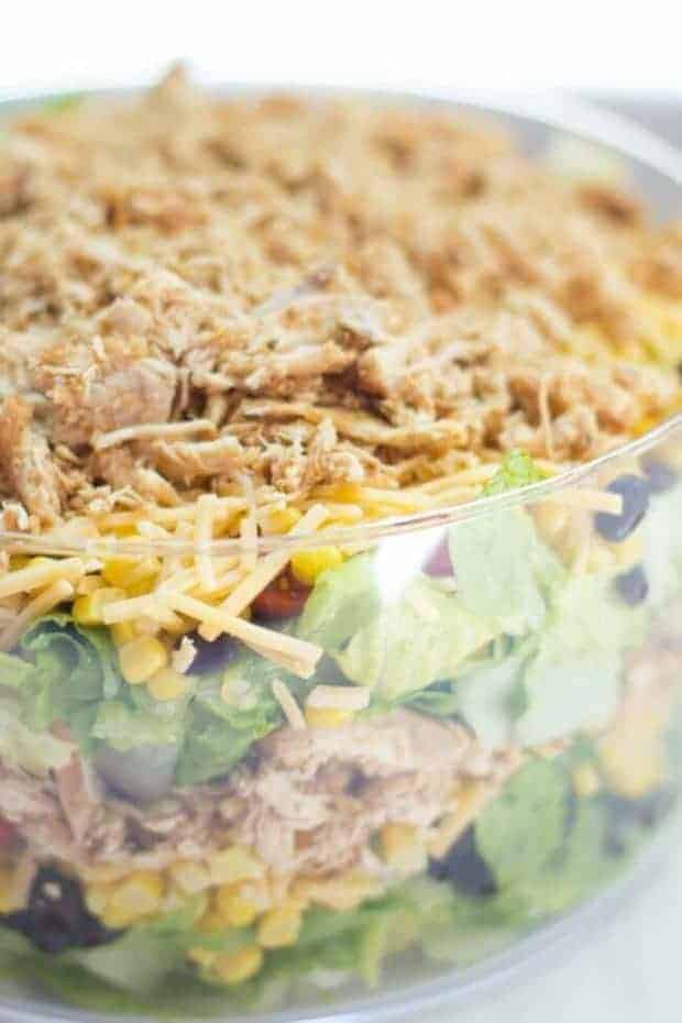 A close-up image of chopped Mexican layer salad